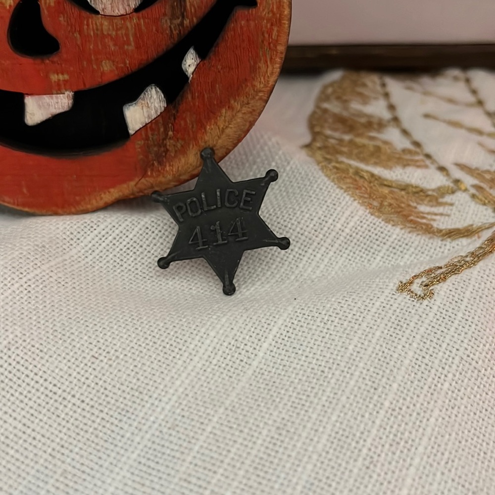 Vintage Metal star with Police 414